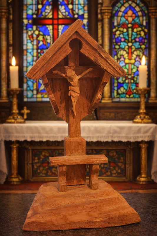 A hand-carved devotional crucifix designed in the tradition of the small roadside shrines - Pediatric Mission